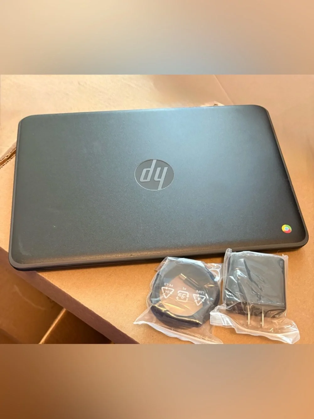 HP Chromebook 11a G6 EE (WiFi) Laptop in Matte Black with Chrome Accent.